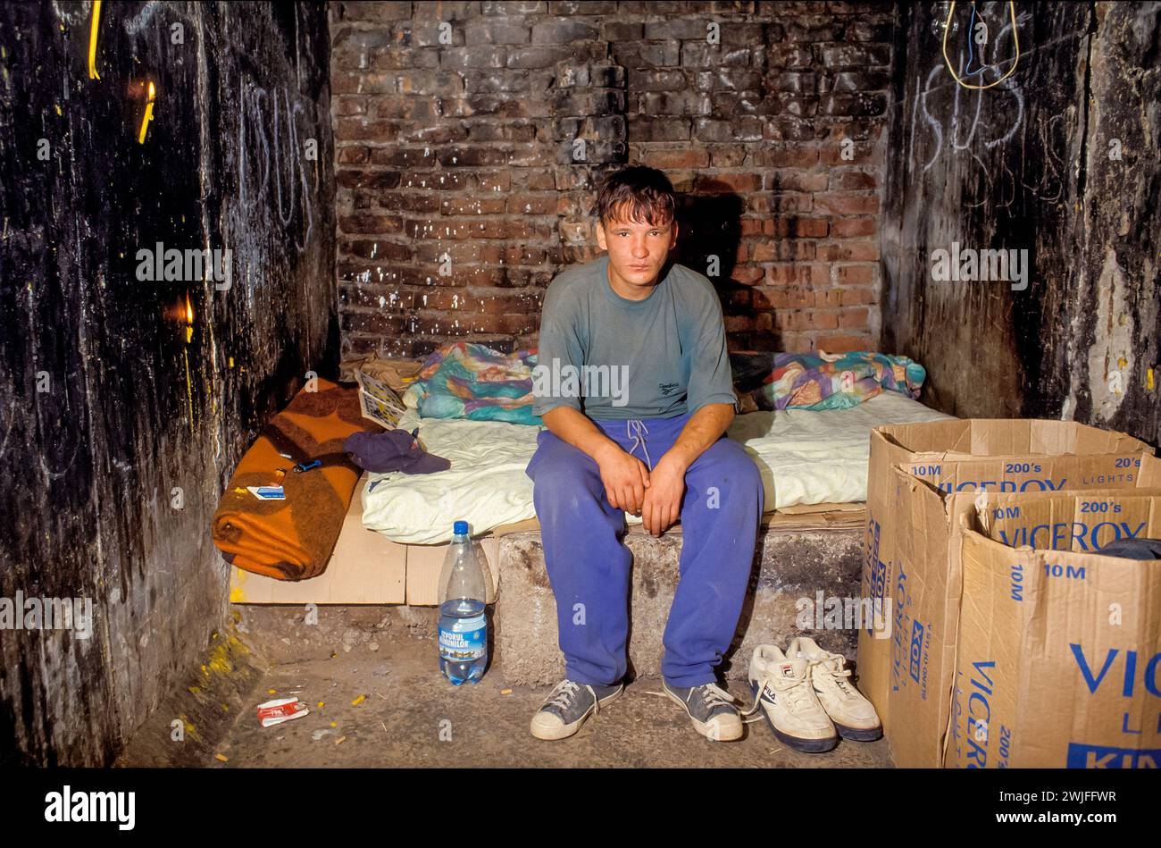 Romania, Bucarest. Homeless youth found shelter in a sewer. Stock Photo