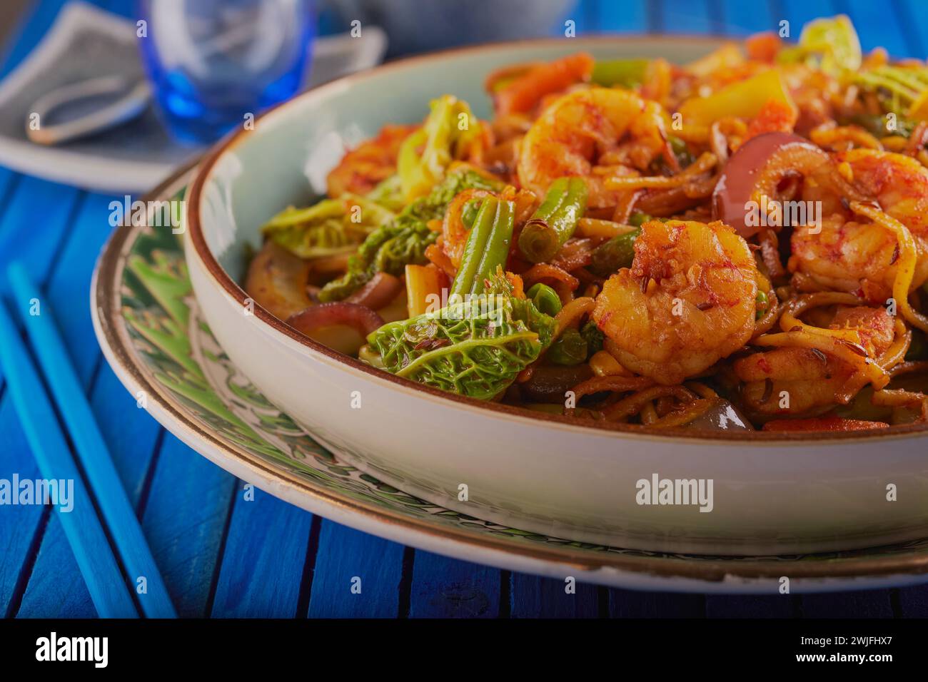 Asian styled king prawn stir fry Stock Photo - Alamy