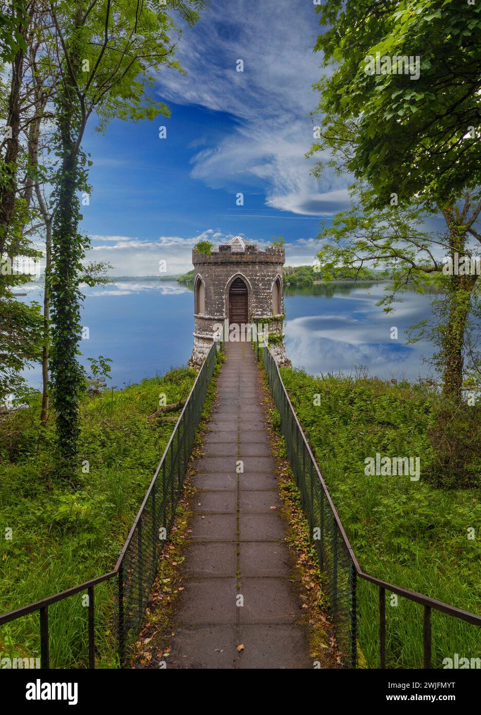 The little circular fishing gazebo folly on the shore of Lough Key on the old Rockingham estate in County Roscommon, Ireland Stock Photo