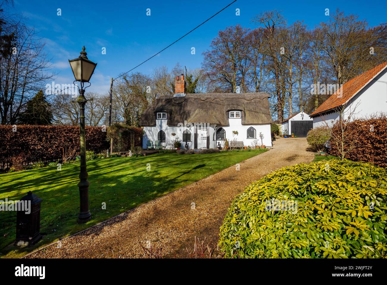 Dalham, Suffolk, England - Feb 19 2016: 16th Century thatched grade II listed cottage Stock Photo