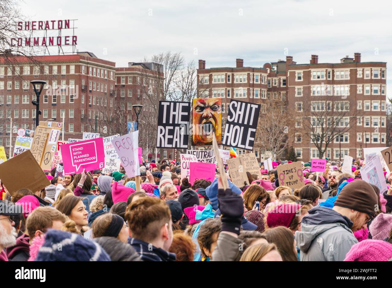 Cambridge, MA, USA–January 20, 2018. Rally on the 1st anniversary of the Women's March. Many displayed anti-Trump signs . Stock Photo