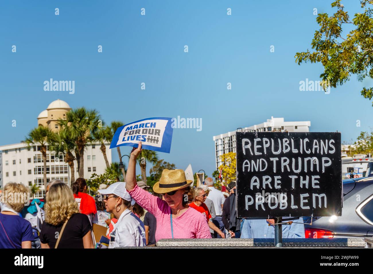 Sarasota, FL, US -March 24, 2018 - Protesters March For Our Lives holding sign reading 'Republicans & Trump are the Problem' Stock Photo
