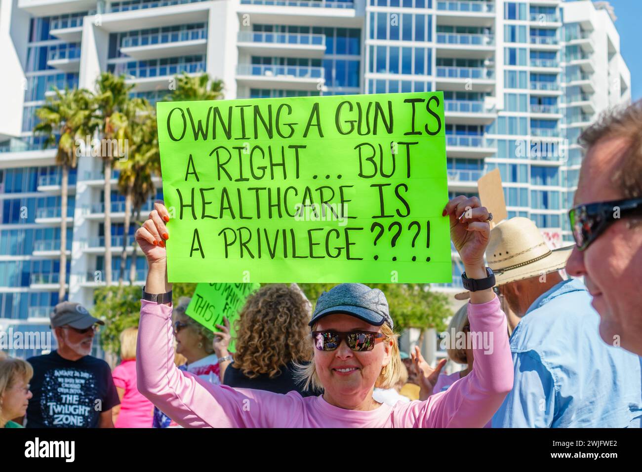 Sarasota, FL, US -March 24, 2018 - Protesters gather at the student-led protest March For Our Lives holding sign about gun ownership Stock Photo