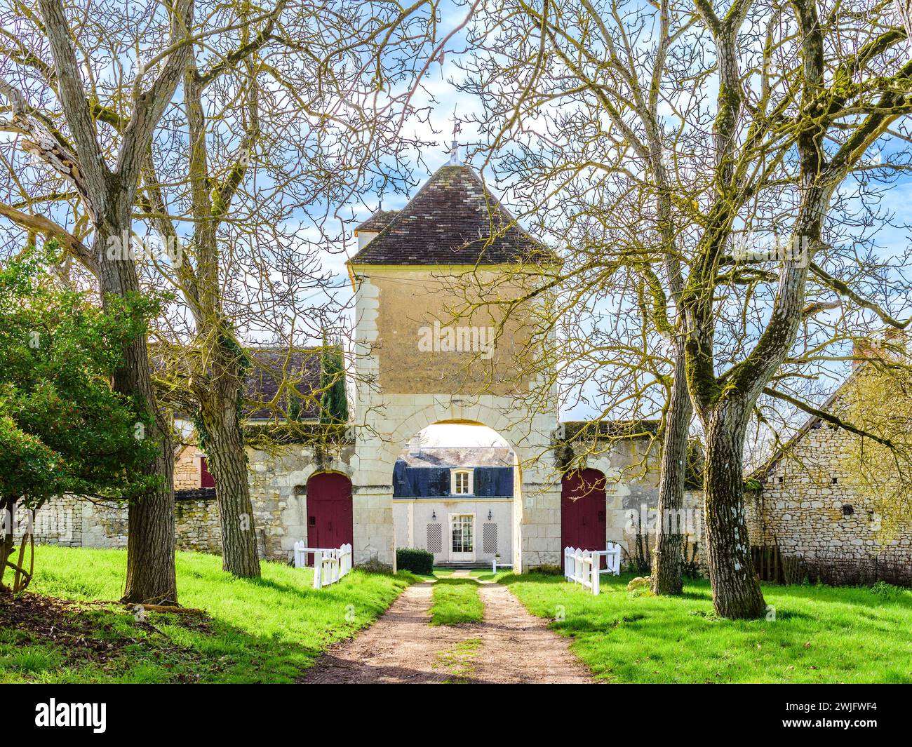 Entrance gateway, tower and arch to the Notz l'Abbé religious priory, Indre (36), France. Stock Photo