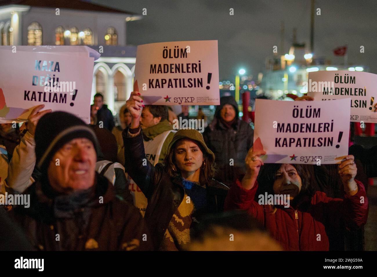 Kadikoy, Istanbul, Turkey. 15th Feb, 2024. Demonstrators carries banners during the protest against 9 people being buried under the ground as a result of a landslide at the gold mine site in the Ä°lic district of Erzincan in Turkey, on February 13, 2024. The Chief Public Prosecutor's Office launched an investigation regarding the incident and a total of 8 people have been detained sinceÂ yesterday. (Credit Image: © Tolga Uluturk/ZUMA Press Wire) EDITORIAL USAGE ONLY! Not for Commercial USAGE! Stock Photo