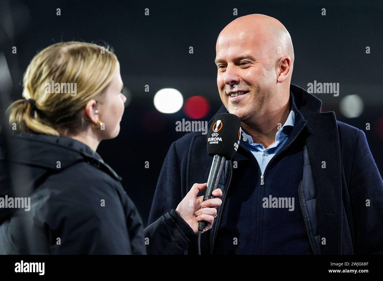 Rotterdam, The Netherlands. 15th Feb, 2024. Rotterdam - Noa Vahle, Feyenoord coach Arne Slot during the 1st leg of the UEFA Europa League Knockout Round Play-offs between Feyenoord v AS Roma at Stadion Feijenoord De Kuip on 15 February 2024 in Rotterdam, The Netherlands. Credit: box to box pictures/Alamy Live News Stock Photo