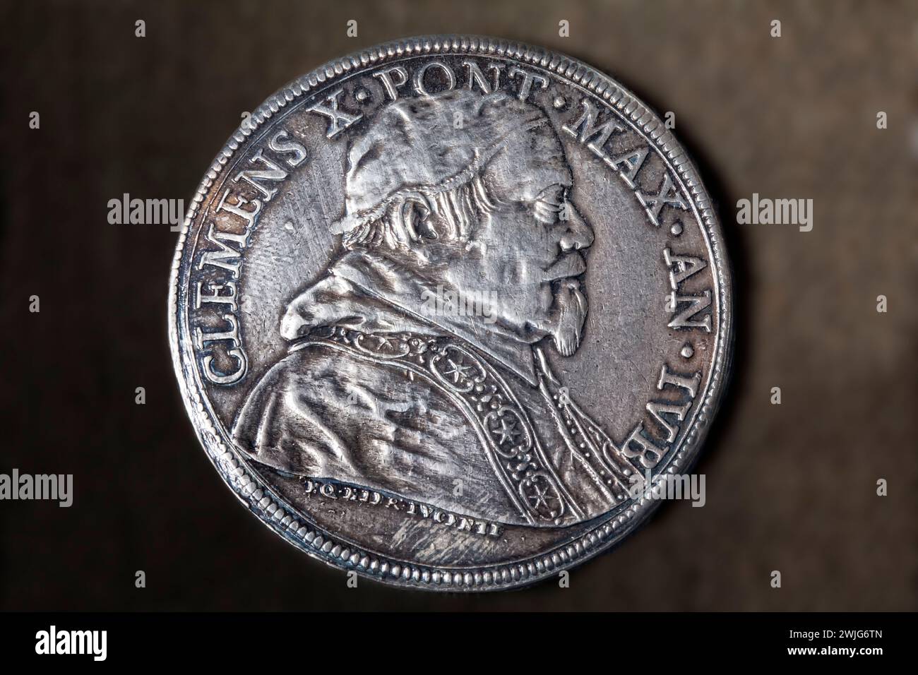 Old silver coin, portrait of Pope Clement X, 1590 – 1676 Stock Photo