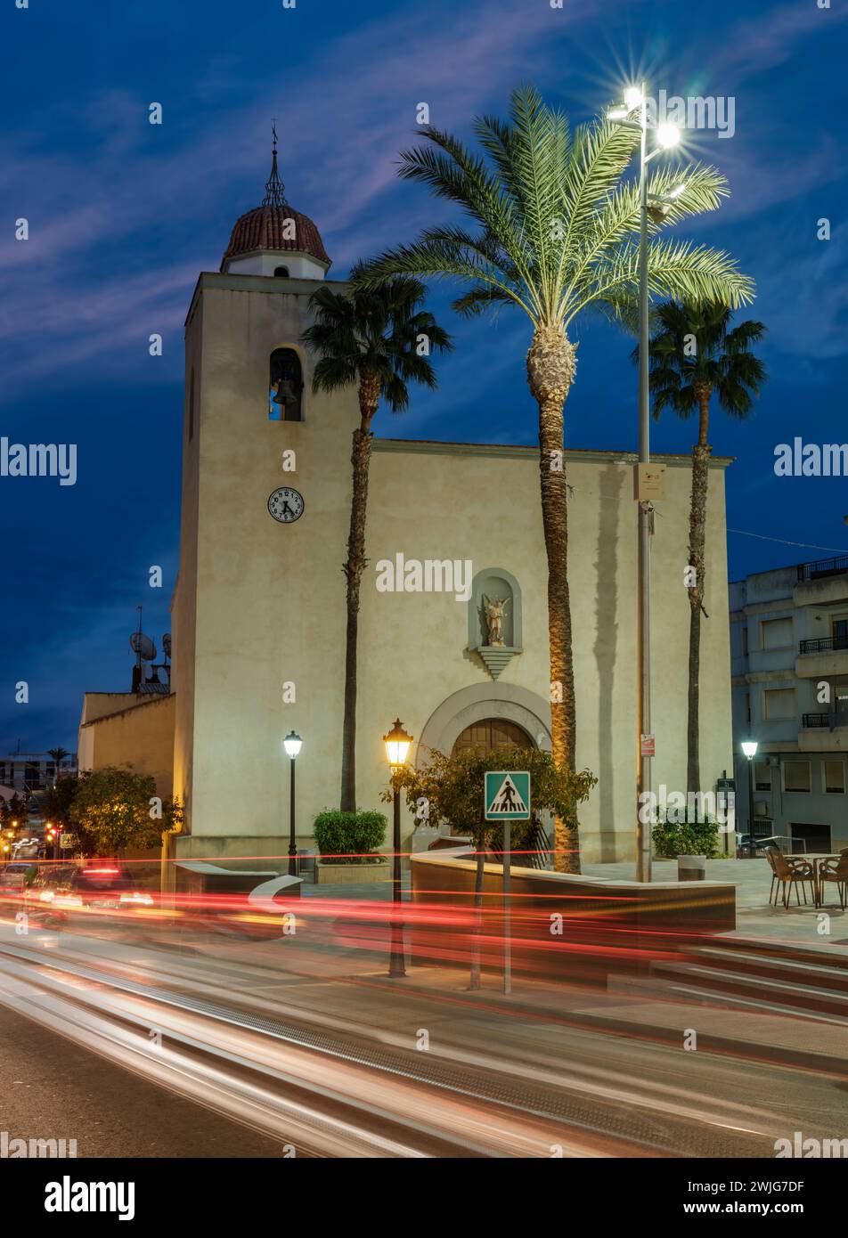San Miguel de Salinas On a January evening rush hour traffic passes the picturesque square at