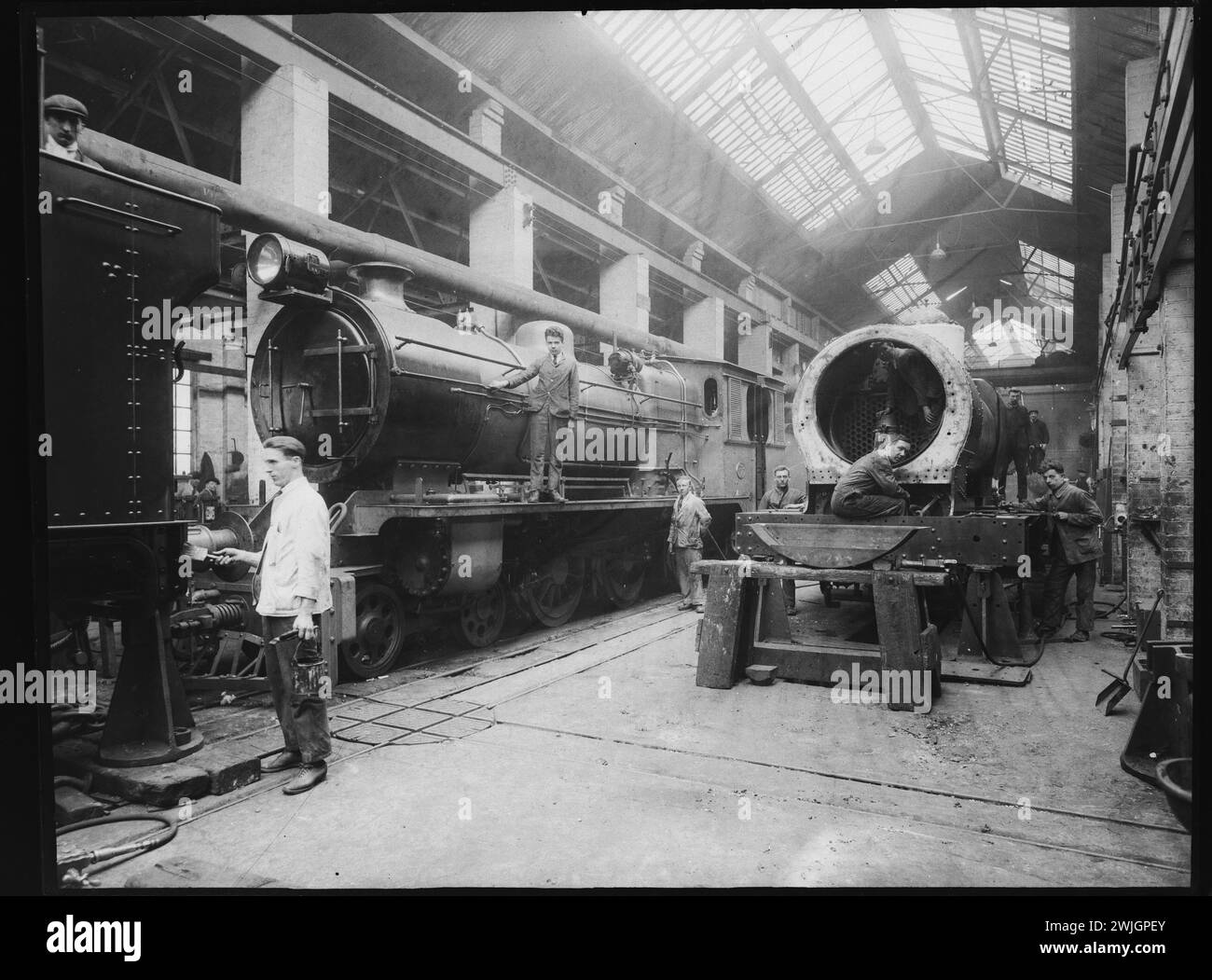 BAGNALL'S ENGINE WORKS STAFFORD GLASS PLATE NEGATIVES. These Glass Plates were rescued, pending being skipped way back and are of images taken between the two world wars. Showing amazing features and staff of the factory back in time. Some wonderful images that I have painstakingly digitalised. Very rare. Stock Photo