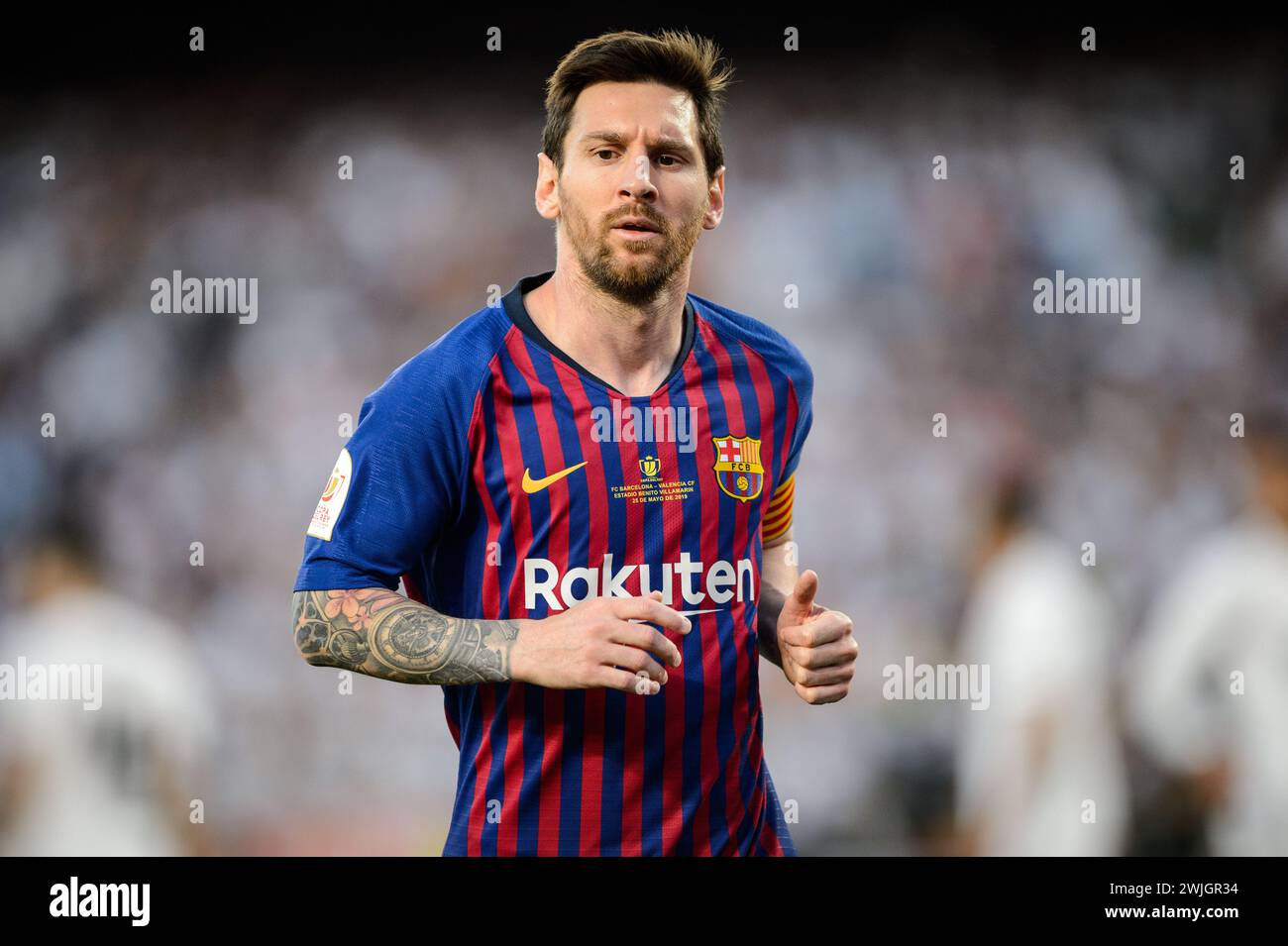 Close-up portrait of Futbol Club Barcelona's Leo Messi heading to the corner during the Copa del Rey Final in Seville, Spain. Stock Photo