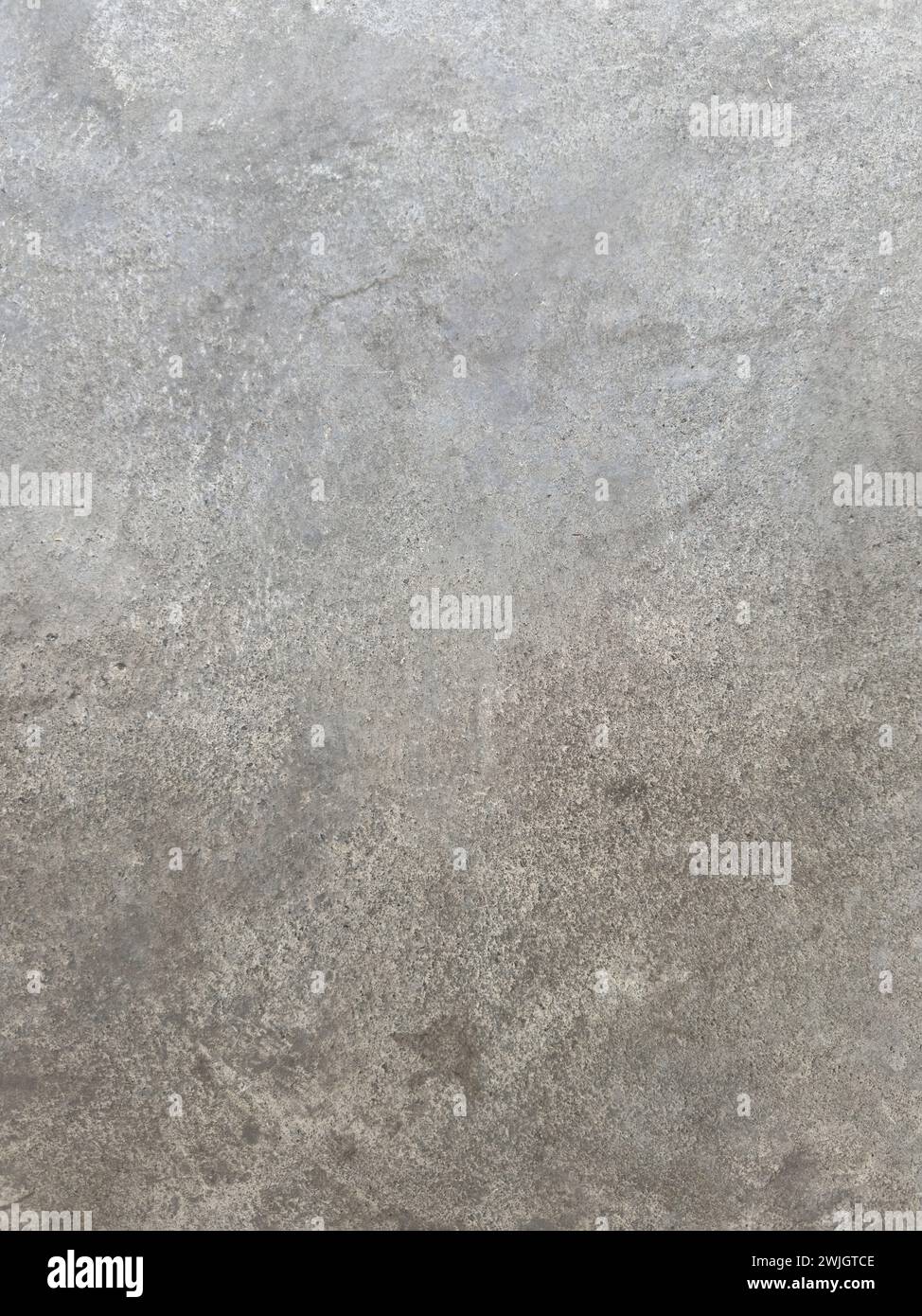 Grungy gray color floor concrete texture background close up view Stock Photo