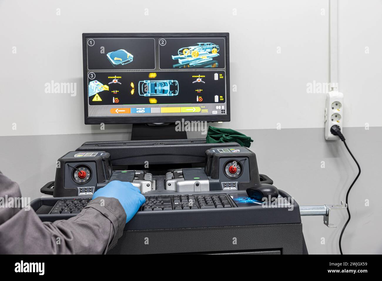 Istanbul Turkey 23 March 2023; Car wheel balancing service. Car wheel balancing in tire service. Mechanic working with wheel balancing machine at tire Stock Photo