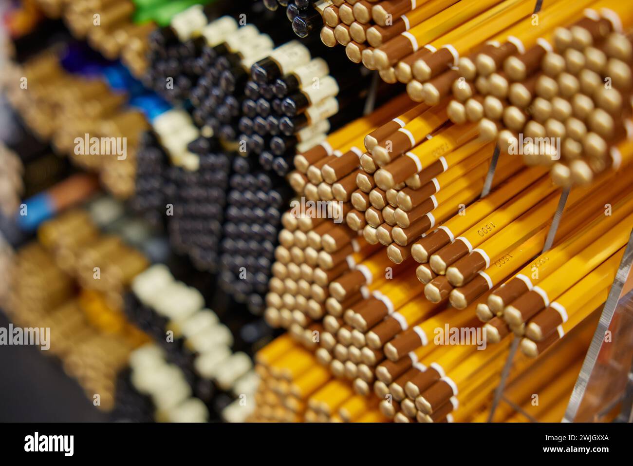 Various pencils on rack display for sale in stationery shop Stock Photo ...