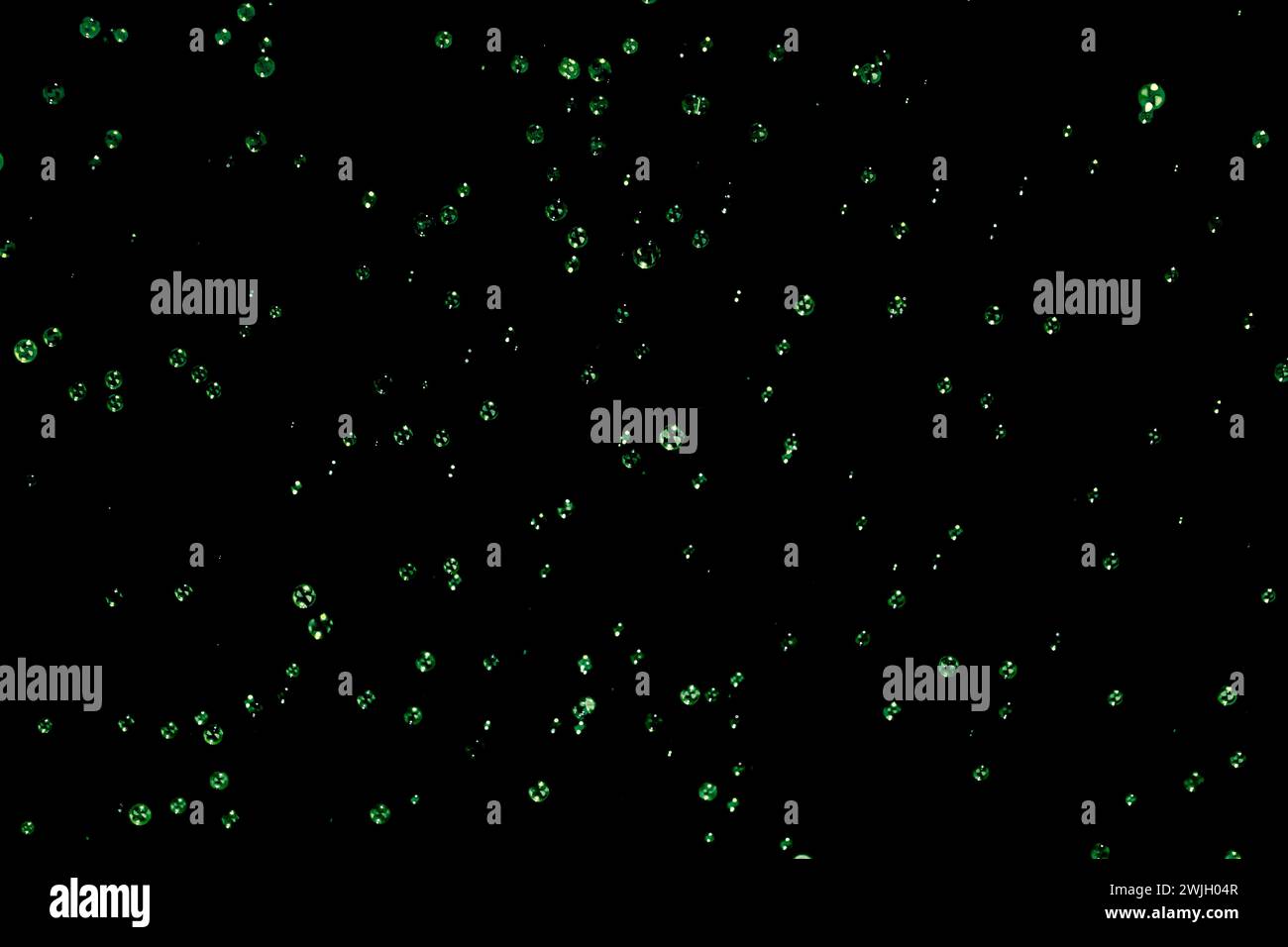 Green Soap bubbles on the dark background Stock Photo