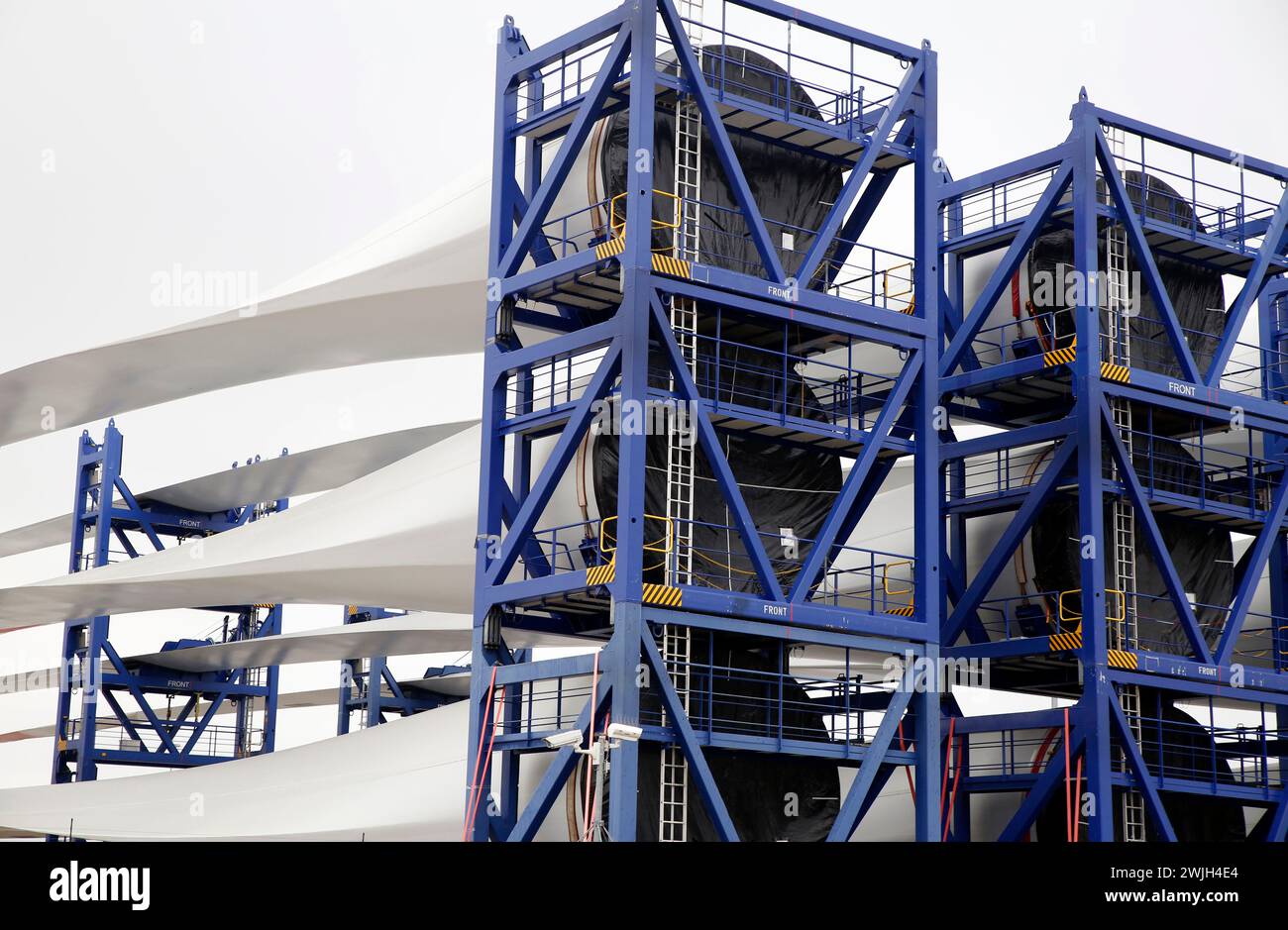 Newly constructed wings of wind-turbines ready to be transported to an offshore windpark, The Netherlands Stock Photo