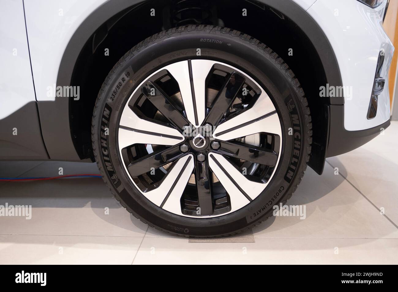 closeup wheel, cap of Volvo XC40 Recharge Electric Car, SUV crossover Swedish company Volvo Cars in showroom, EV in Europe, Innovation in automotive i Stock Photo