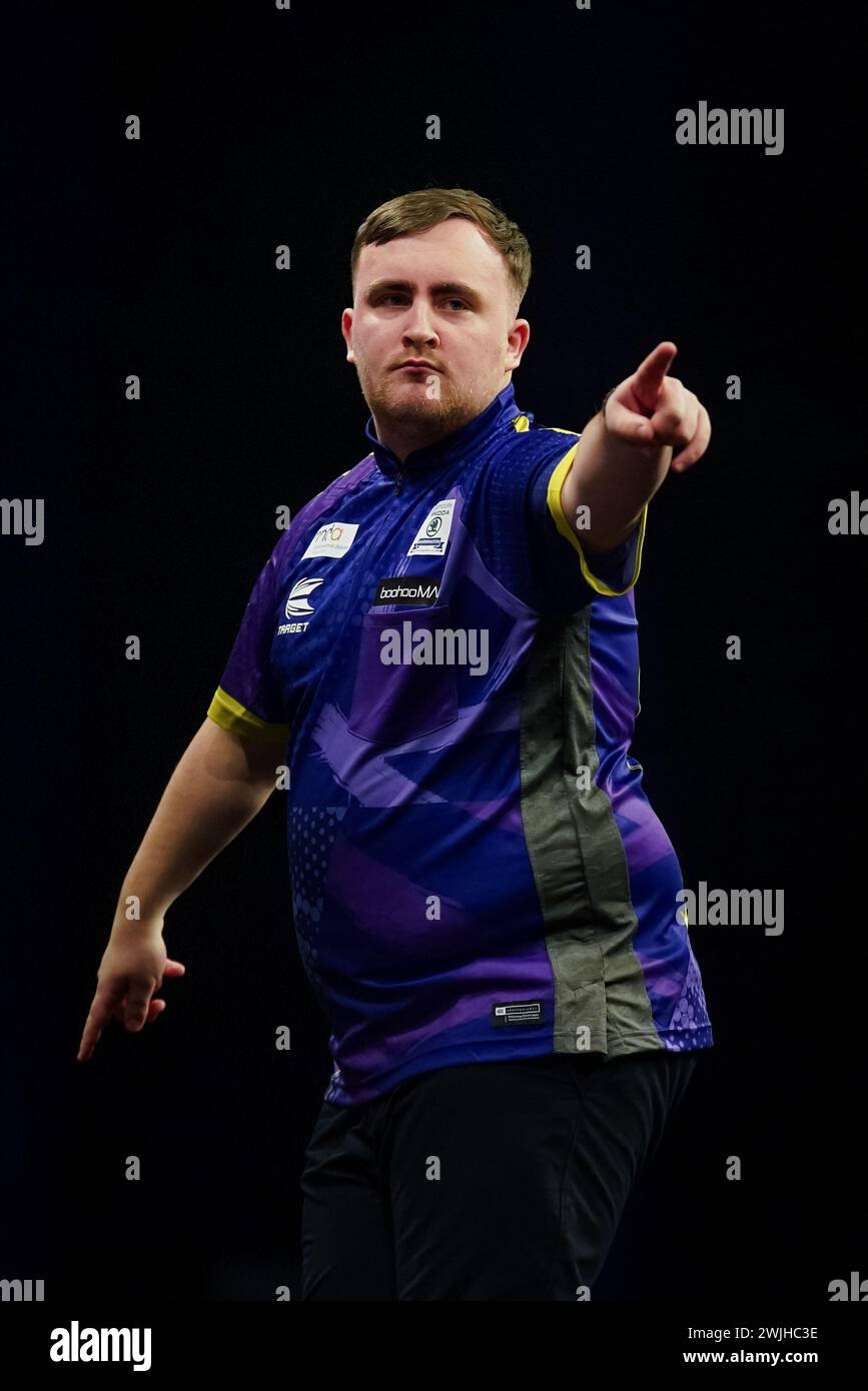 Luke Littler in action against Gerwyn Price (not pictured) during night