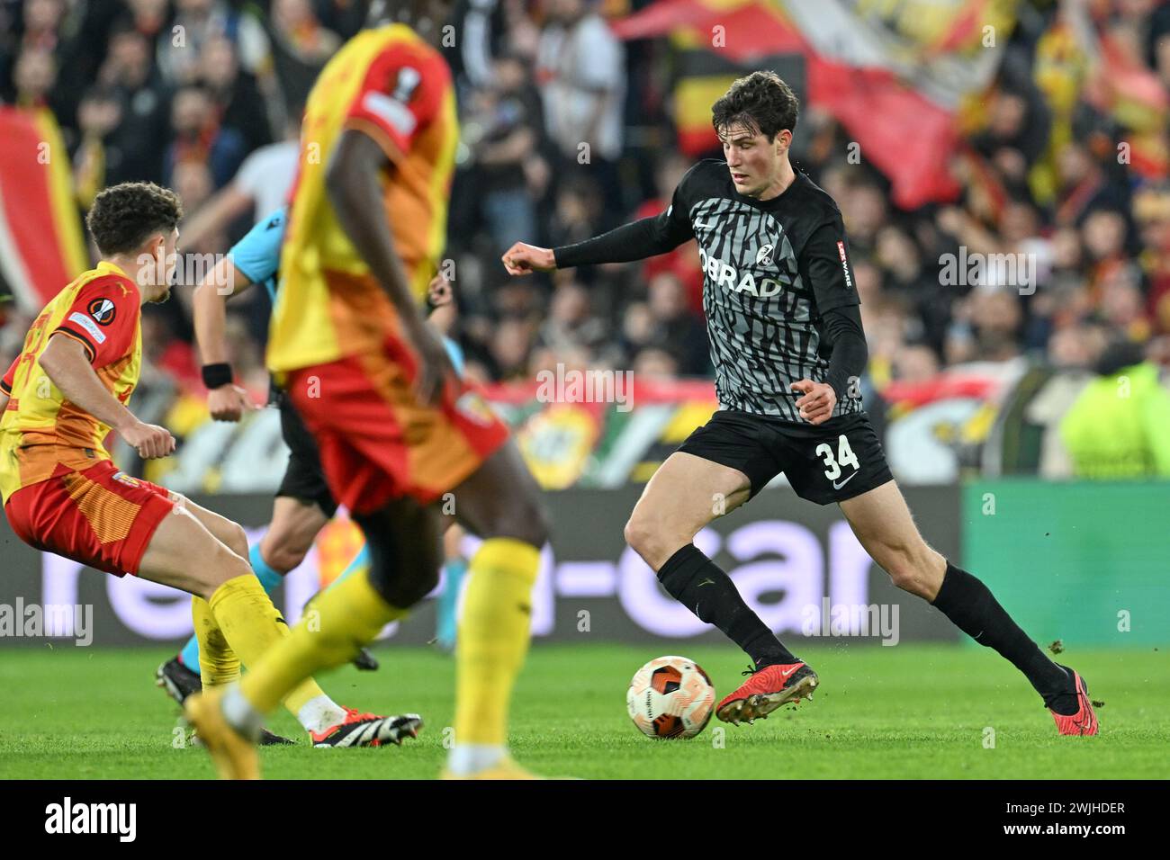 Lens, France. 15th Feb, 2024. Merlin Röhl (34) of Freiburg pictured in action during the Uefa Europa League play-off -first leg game in the 2023-2024 season between Racing Club de Lens and SC Freiburg on February 15, 2024 in Lens, France. (Photo by David Catry/Isosport) Credit: sportpix/Alamy Live News Stock Photo