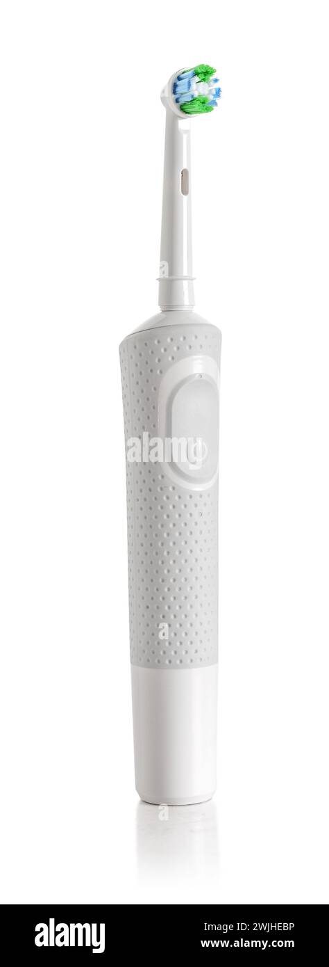 Electric toothbrush isolated on a white background with reflection Stock Photo