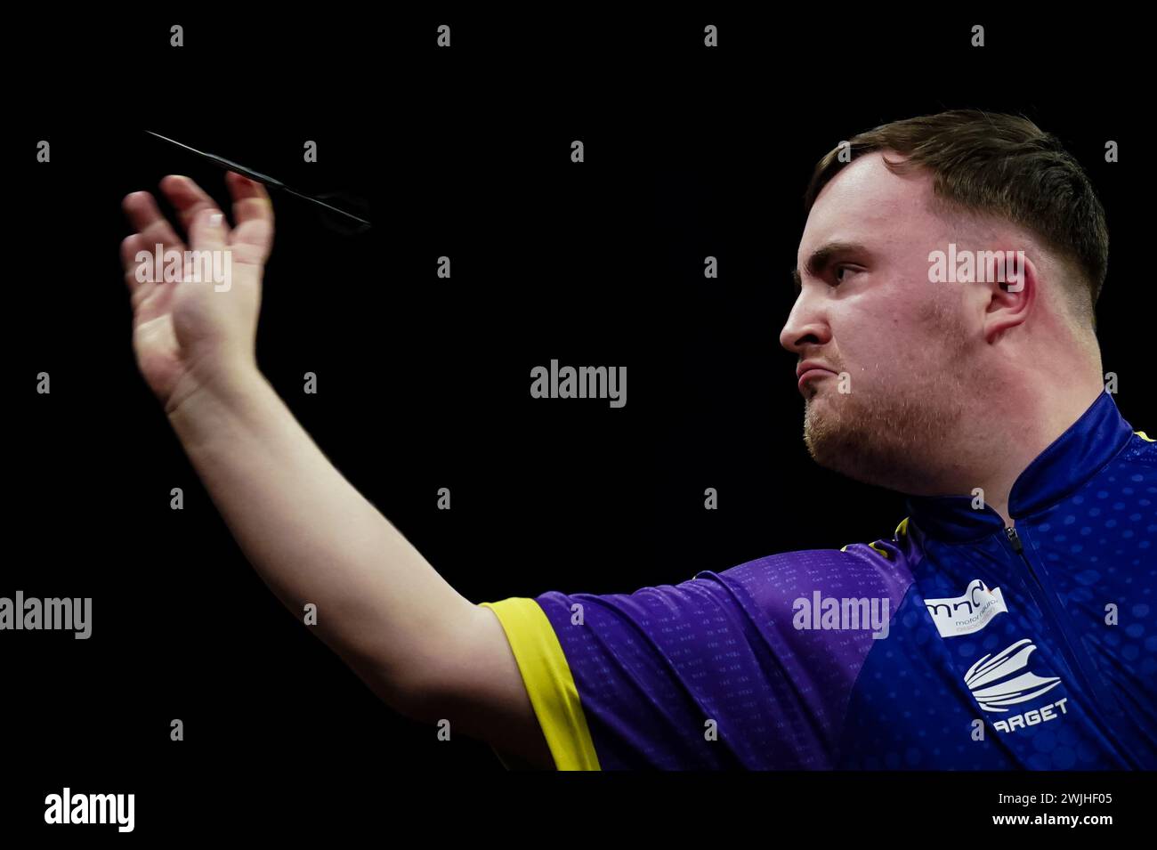 Luke Littler in action against Gerwyn Price (not pictured) during night