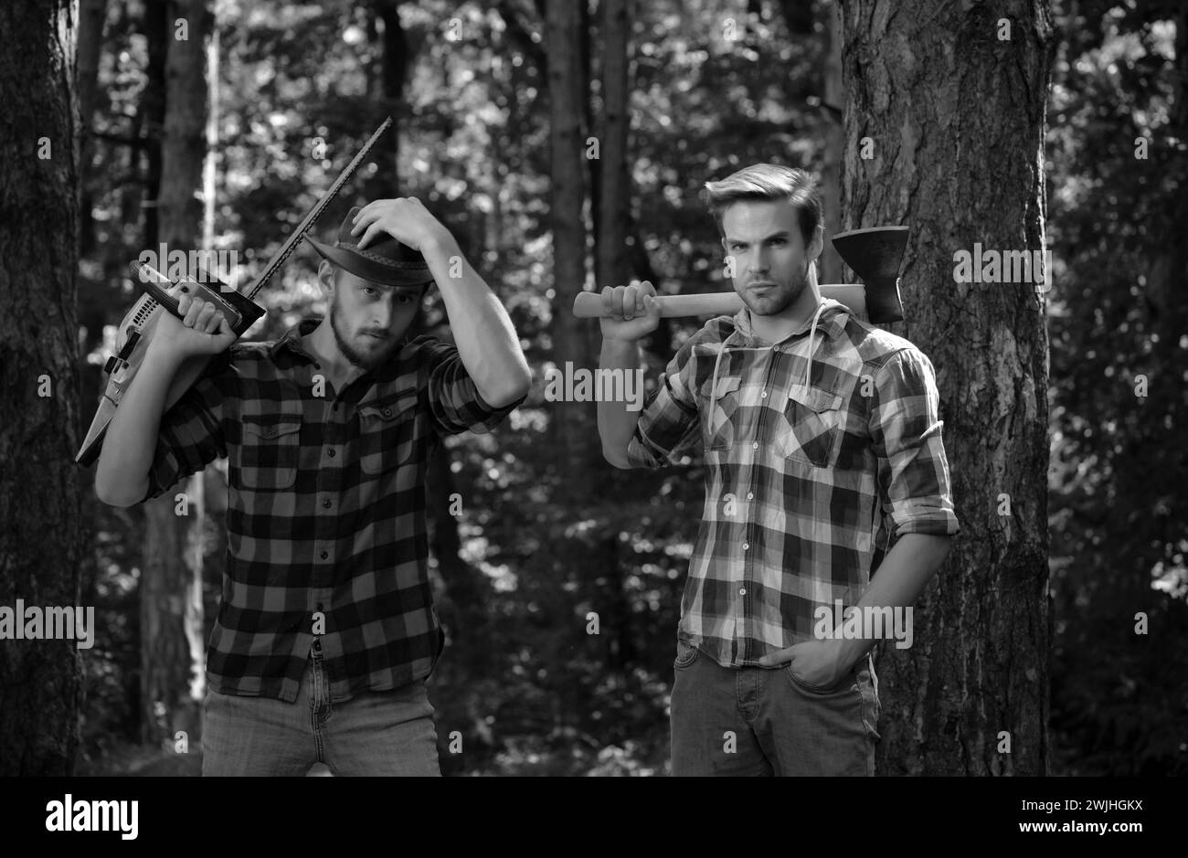 Man hands holding chainsaw Black and White Stock Photos & Images - Alamy