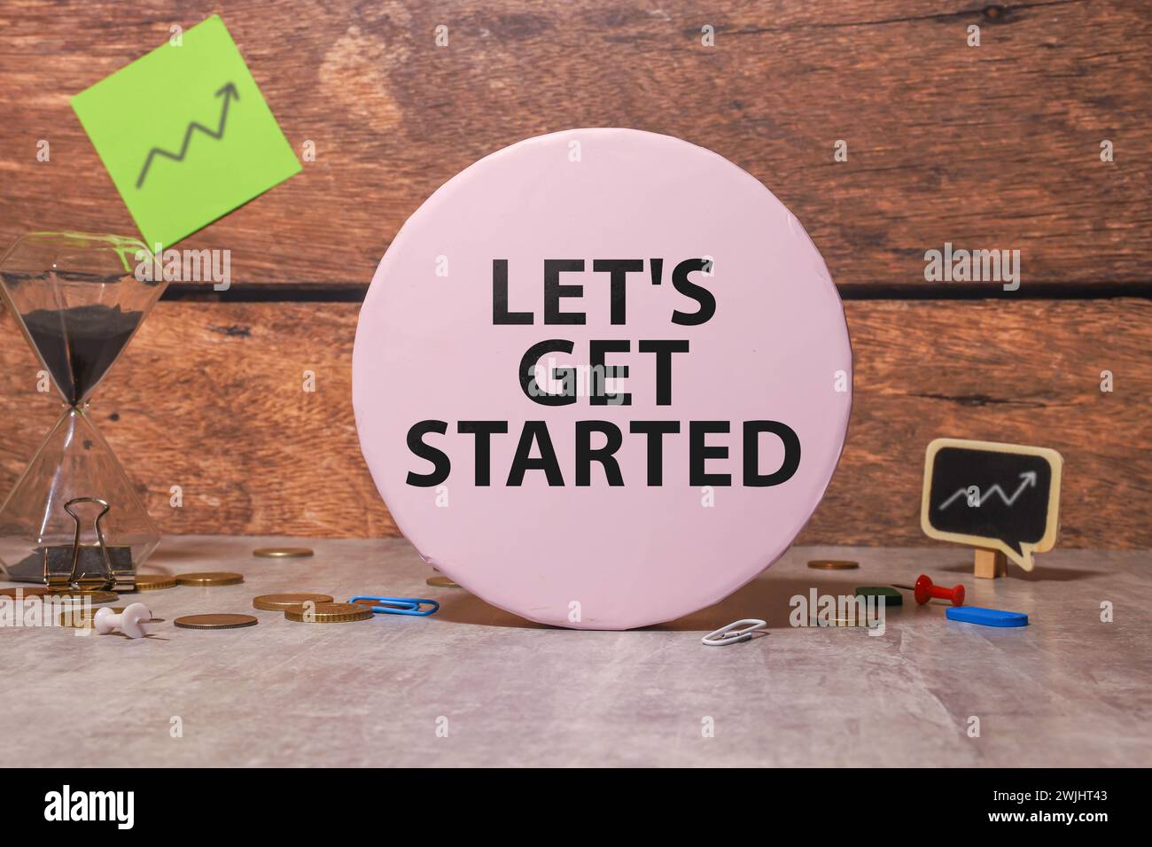 Let's get started is shown using a text. Stock Photo