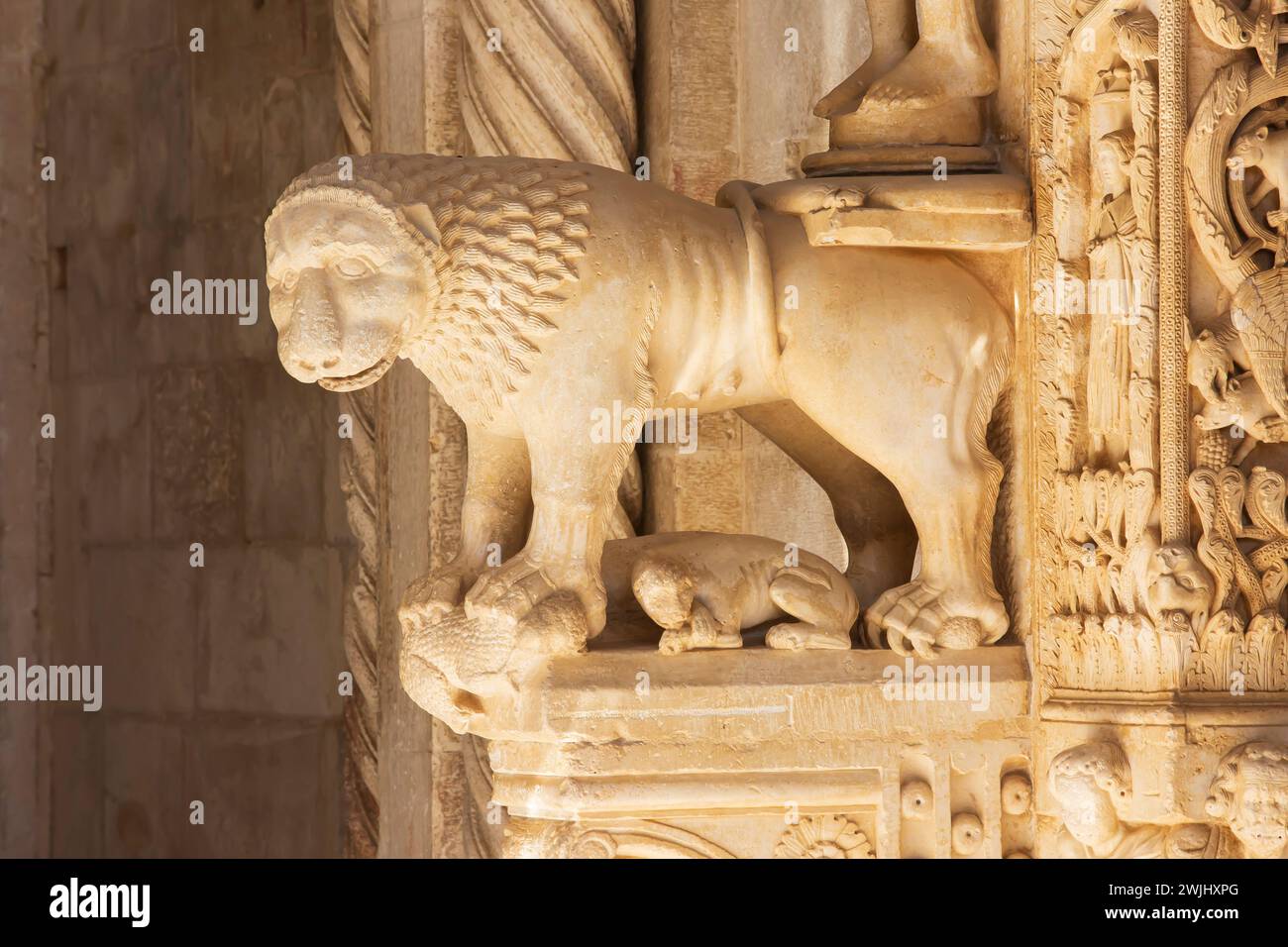 Intricate hand carved sculptures at the main entrance of the Roman Catholic Cathedral of St. Lawrence (13th century) in Trogir, Croatia Stock Photo