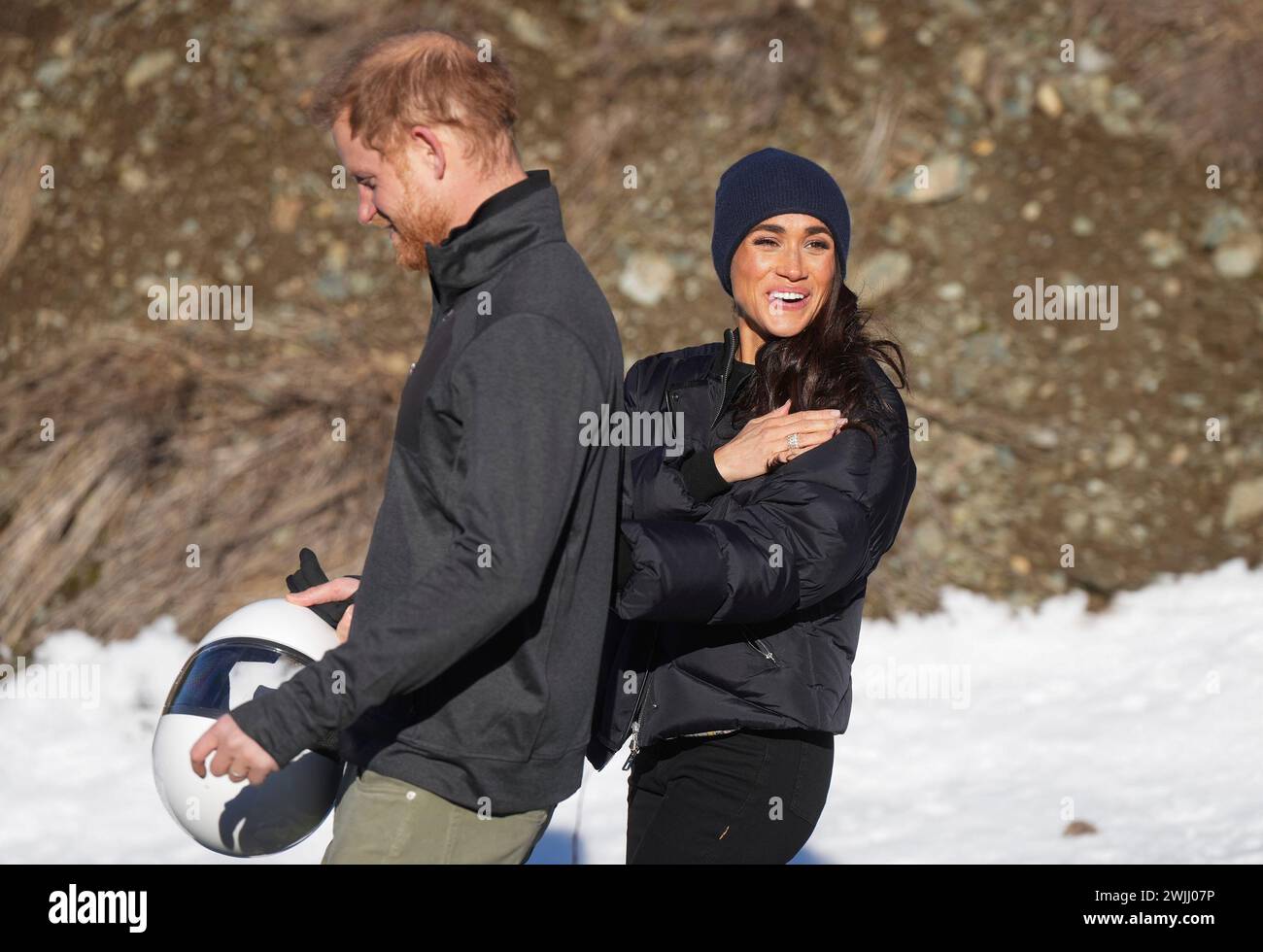 Prince Harry and Meghan Markle, the Duke and Duchess of Sussex, walk