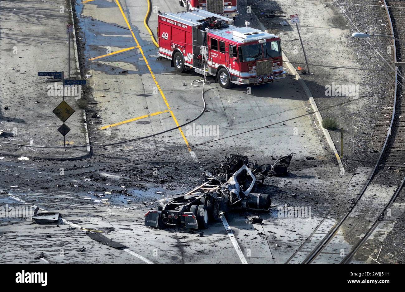 An exploded truck with pressurized cylinders is seen in the Wilmington