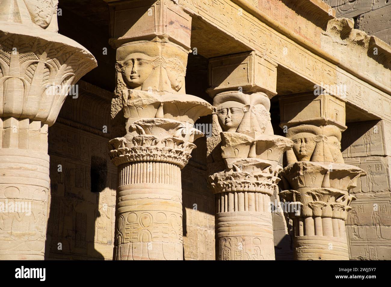 The beautiful temple of Philae and the Greco-Roman buildings seen from the Nile river, a temple dedicated to Isis, goddess of love. Aswan. Egyptian Stock Photo