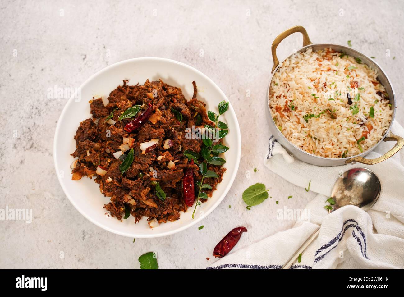 Kerala beef fry roast served with parotta and ghee rice - Malabar Iftar
