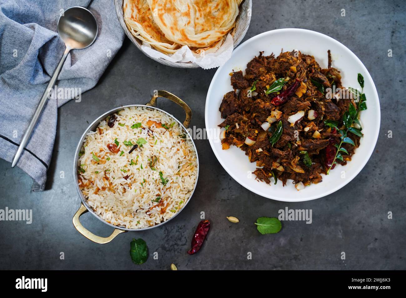 Kerala beef fry roast served with parotta and ghee rice - Malabar Iftar