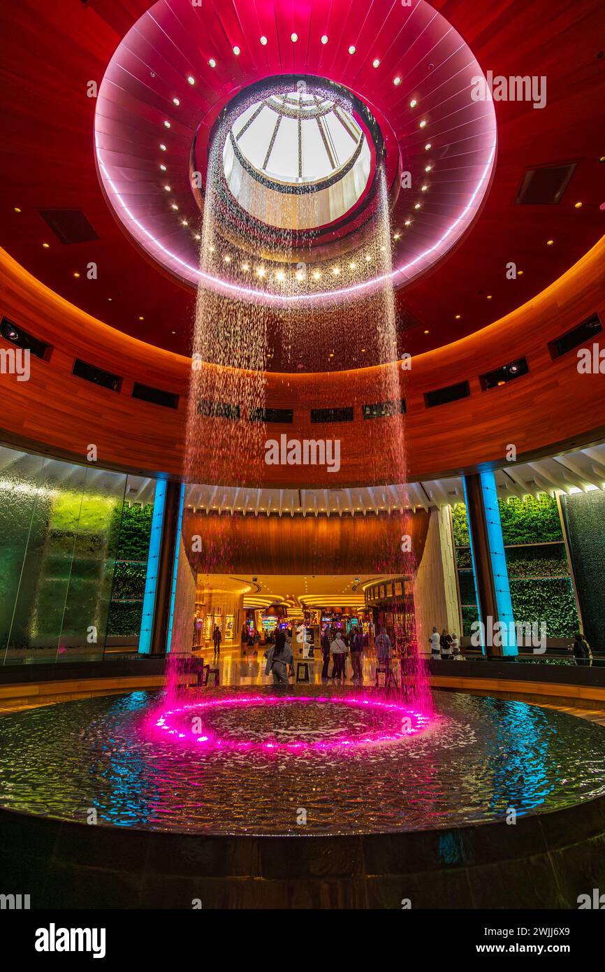 Hollywood, FL - US - Feb 7, 2024 The Oculus, a 35-foot tall central waterfall, combing water, lightning and floor-to-ceiling projections at the Semino Stock Photo