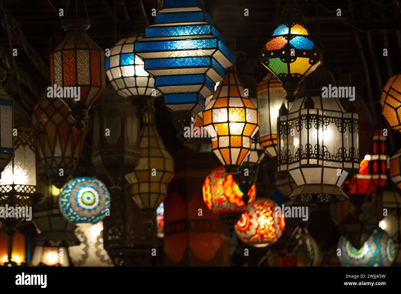 Arabic traditional Ramadan Kareem eastern lanterns garland, Muslim ornamental hanging lanterns Stock Photo