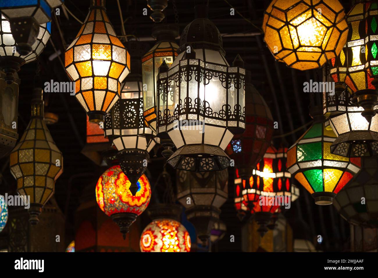 Arabic traditional Ramadan Kareem eastern lanterns garland, Muslim ornamental hanging lanterns Stock Photo