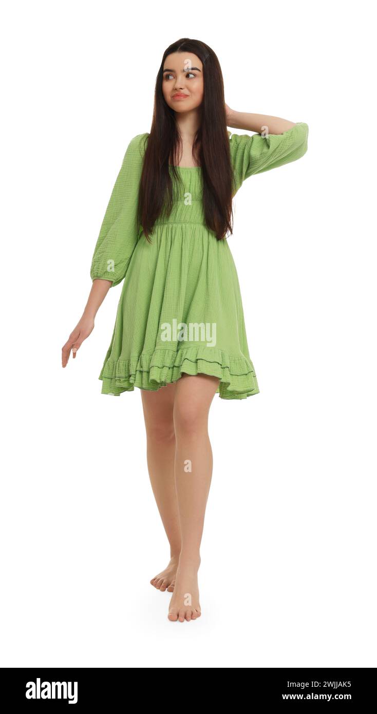 Beautiful girl in green dress on white background Stock Photo