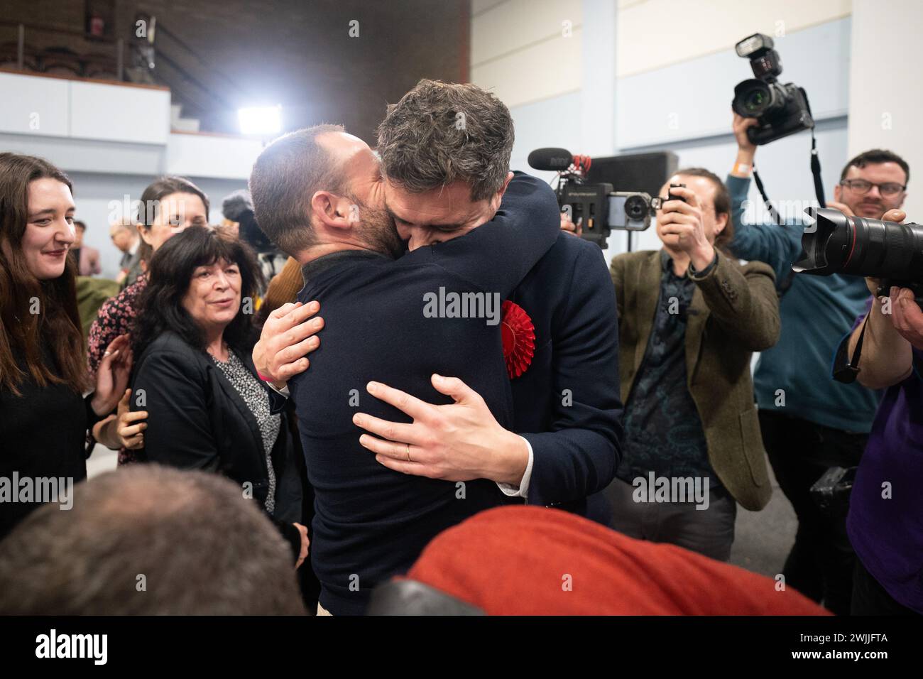 Labour candidate Damien Egan hugs his husband Yossi Felberbaum after being declared MP for Kingswood, after being declared winner in the Kingswood by-election, at the Thornbury Leisure Centre, Gloucestershire. Stock Photo