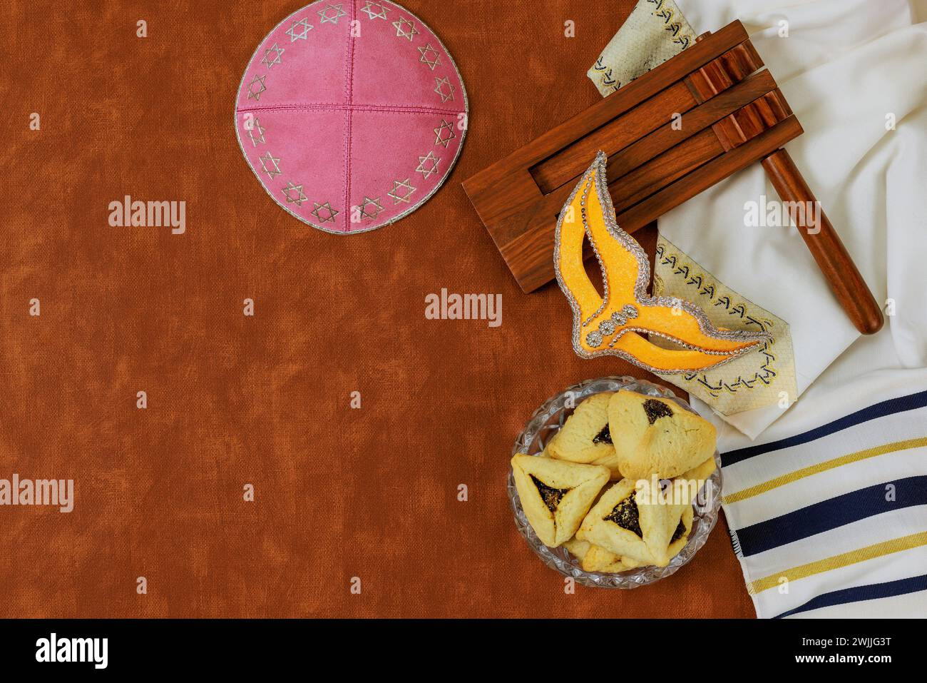 A key symbol jewish festival of purim is rattle carnival mask