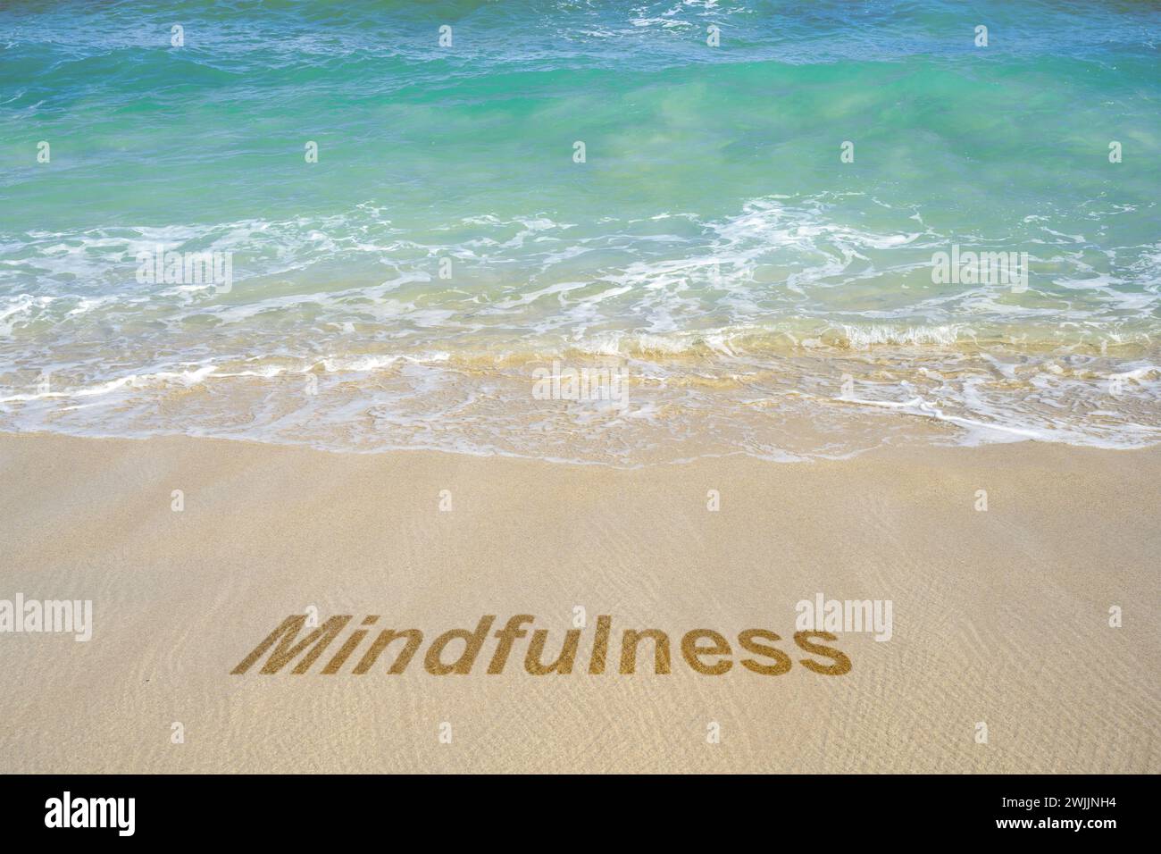 Mindfulness text on the sandy beach with an ocean view. Health ...