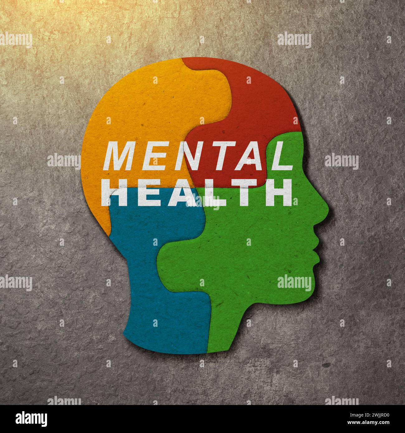 A colorful head puzzle with mental health text is on a colored ...