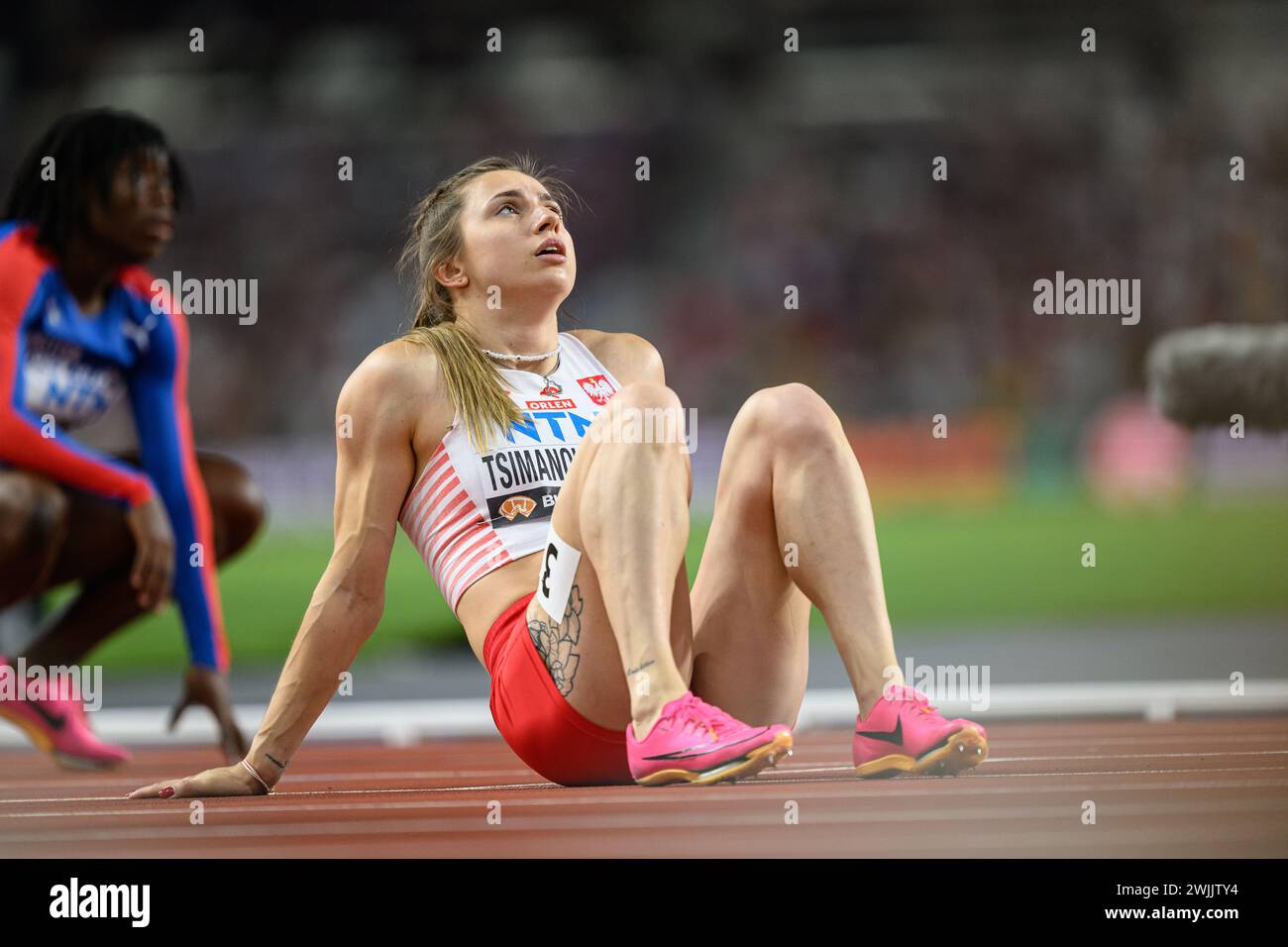 Krystsina TSIMANOUSKAYA participating in the 200 meters at the World ...