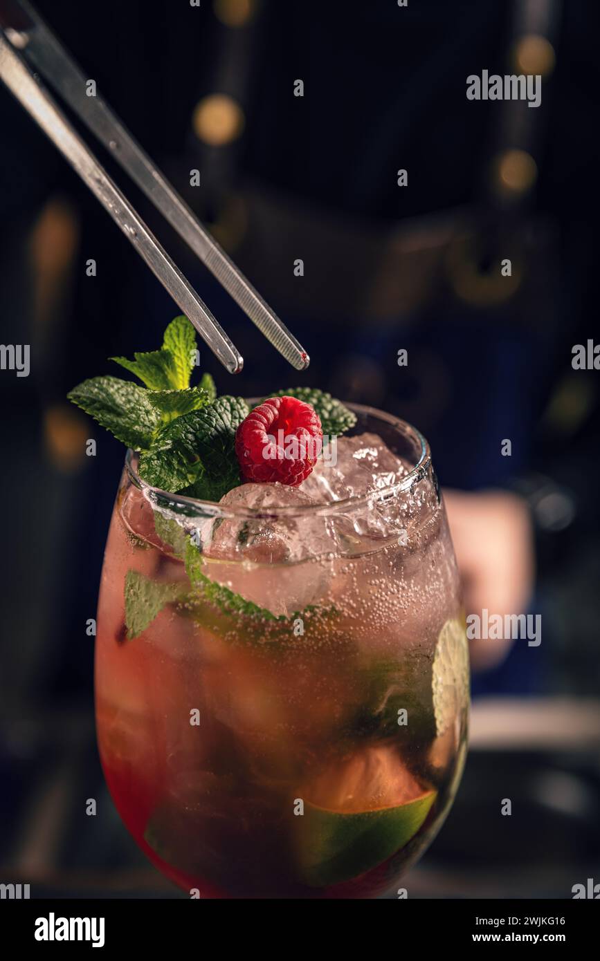 Summer cold refreshing cocktail or mocktail with raspberry, lime and mint Stock Photo