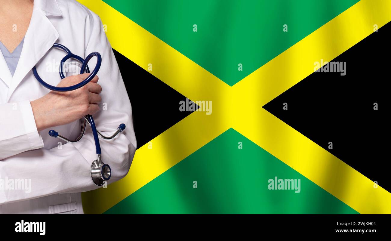 Jamaican medicine and healthcare concept. Doctor close up against flag