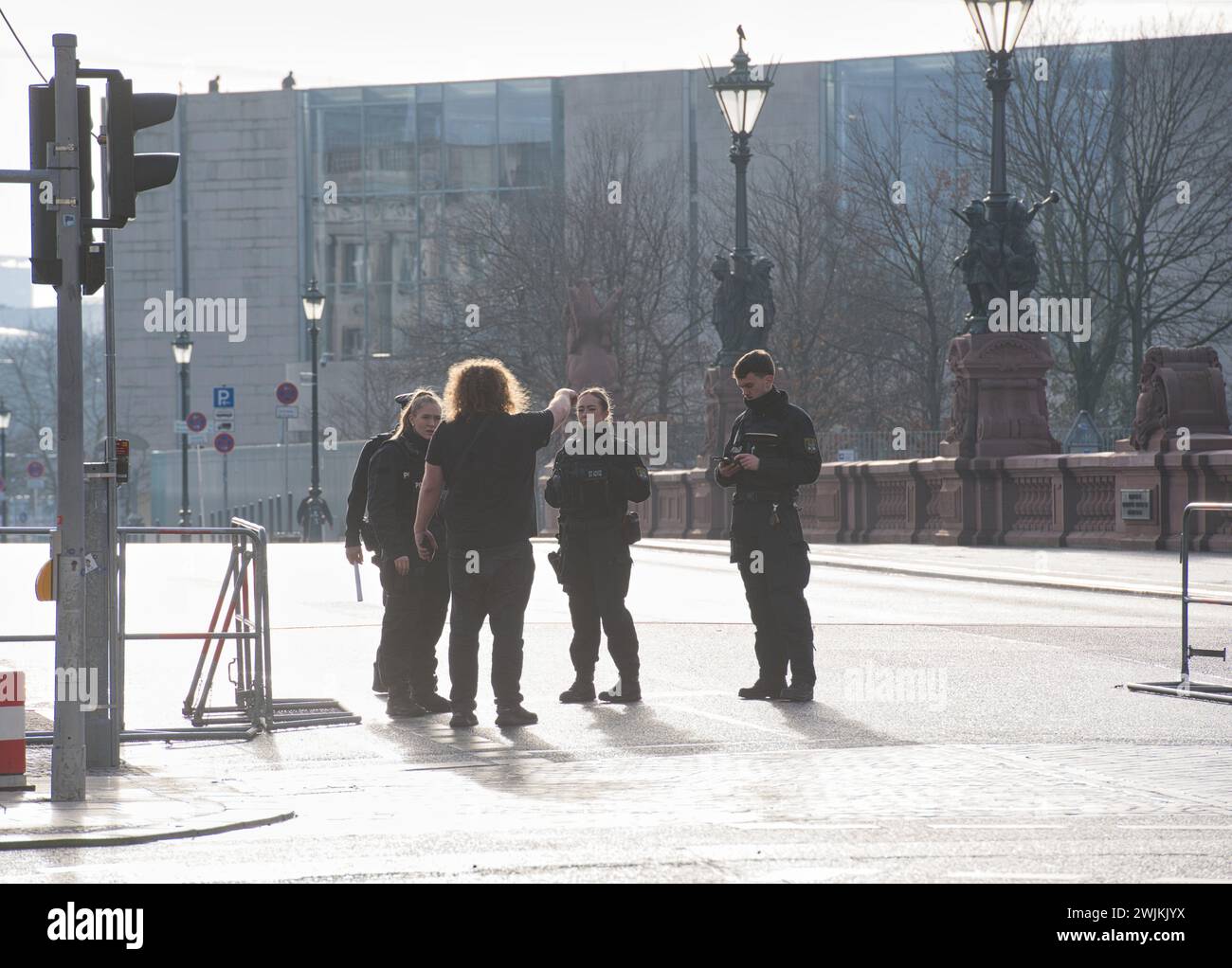 Berlin, Germany. 16th Feb, 2024. Police officers have blocked off a road near the Federal Chancellery. The Ukrainian President will be making his second official visit to Germany since the Russian attack on his country and will meet Chancellor Scholz in Berlin. Credit: Paul Zinken/dpa/Alamy Live News Stock Photo