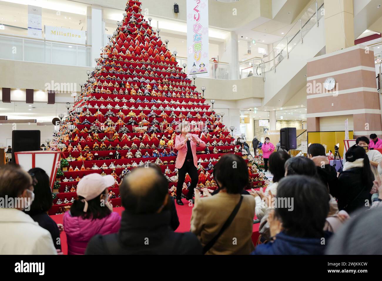 Konosu, Saitama, Japan. 16th Feb, 2024. Japanese singer Hideki Sakuma performs during a special event to celebrate Girls' Day at the Elumi Kounosu Shopping Mall in Konosu city. To commemorate the Hinamatsuri, also known as Doll's Day or Girls' Day, which is celebrated on March 3rd, 1,800 Hina-ningyo (a kind of Japanese doll) are on display on 31 levels of a 7-meter in height doll pyramid in the mall's central area. Every year, families display the dolls in their homes as a wish for the daughters' health and well-being. Konosu city is known as ''Doll Town'' because there are numerous factori Stock Photo