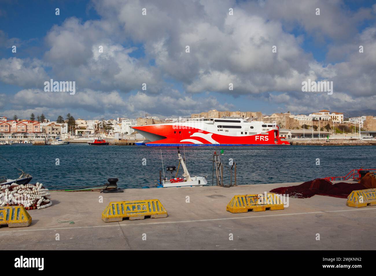 Red HSC Tarifa Jet in the Tarifa harbor. Stock Photo