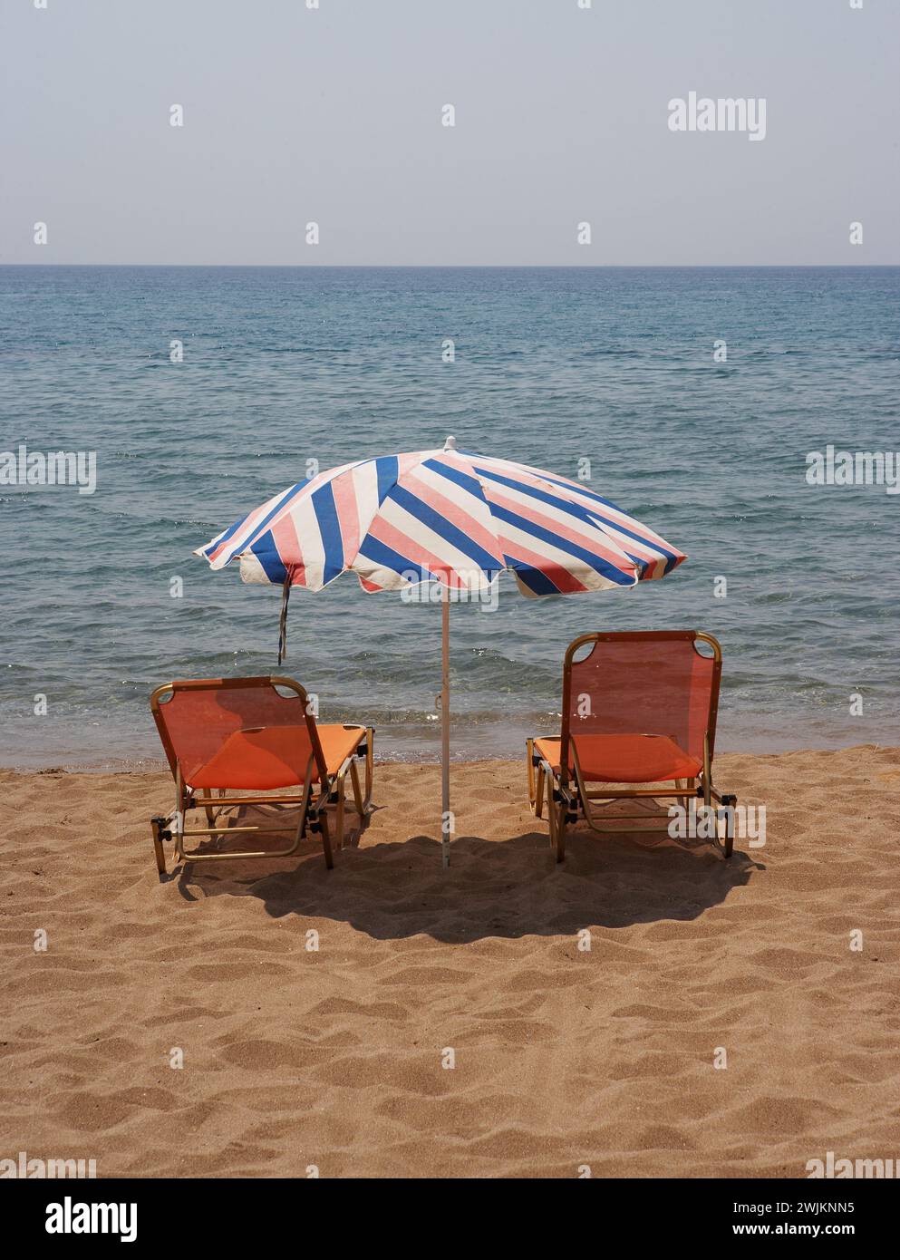 Deck chairs on sandy hi-res stock photography and images - Alamy