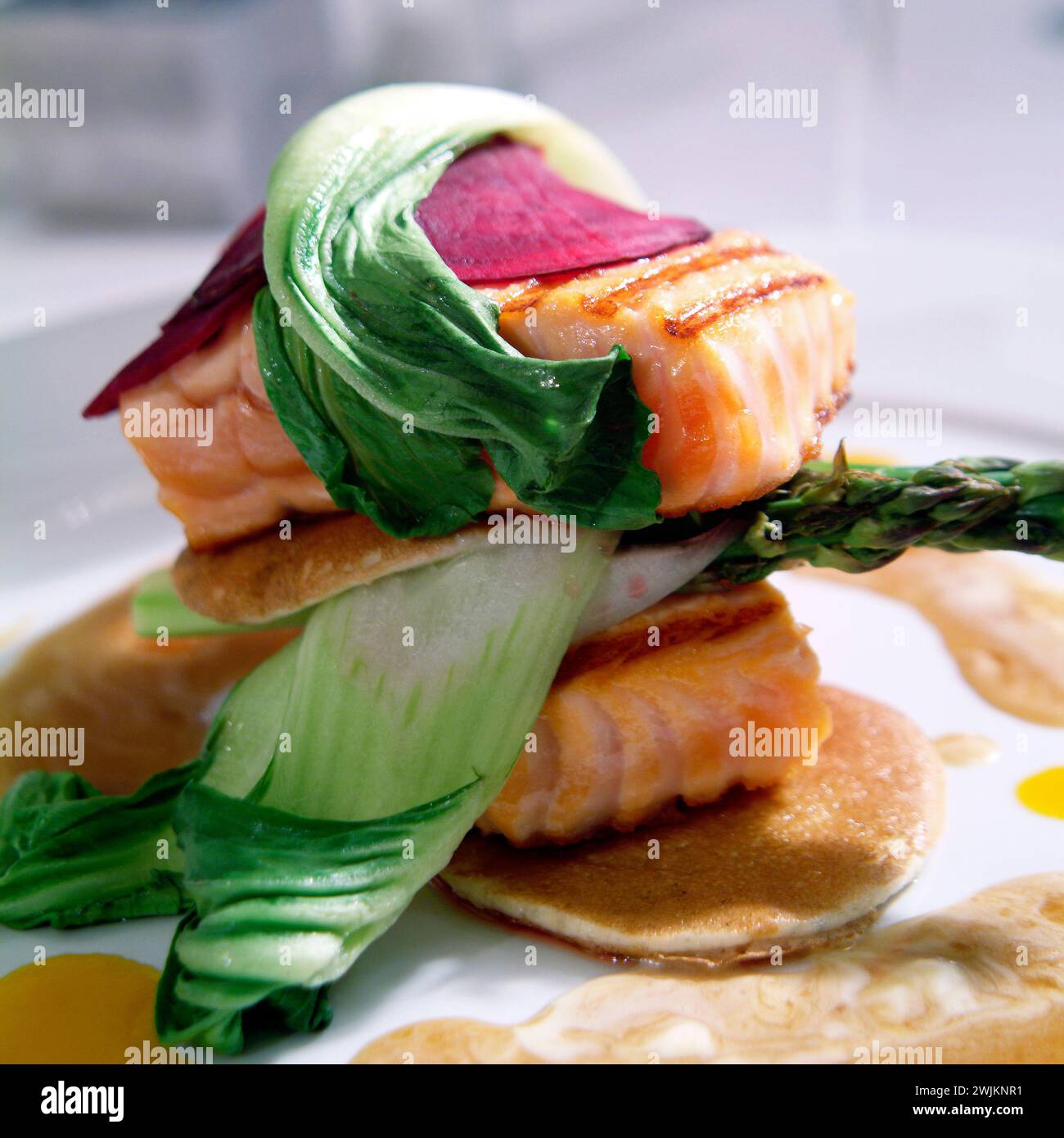 A plate of food with a piece of food on it Stock Photo