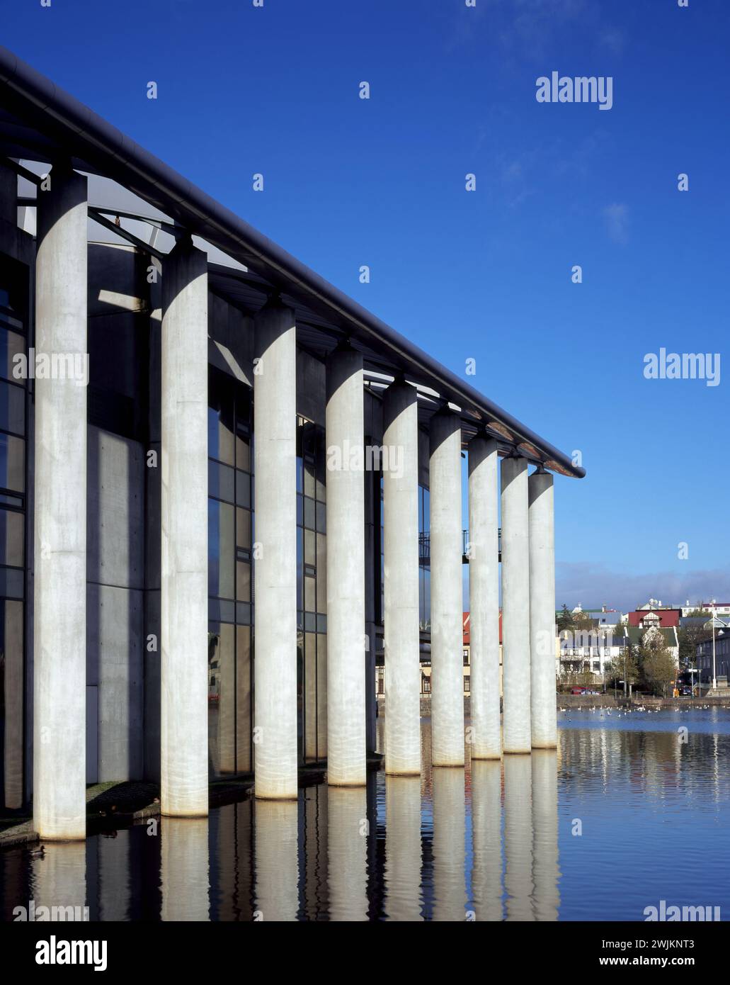A building with pillars on the side of it Stock Photo