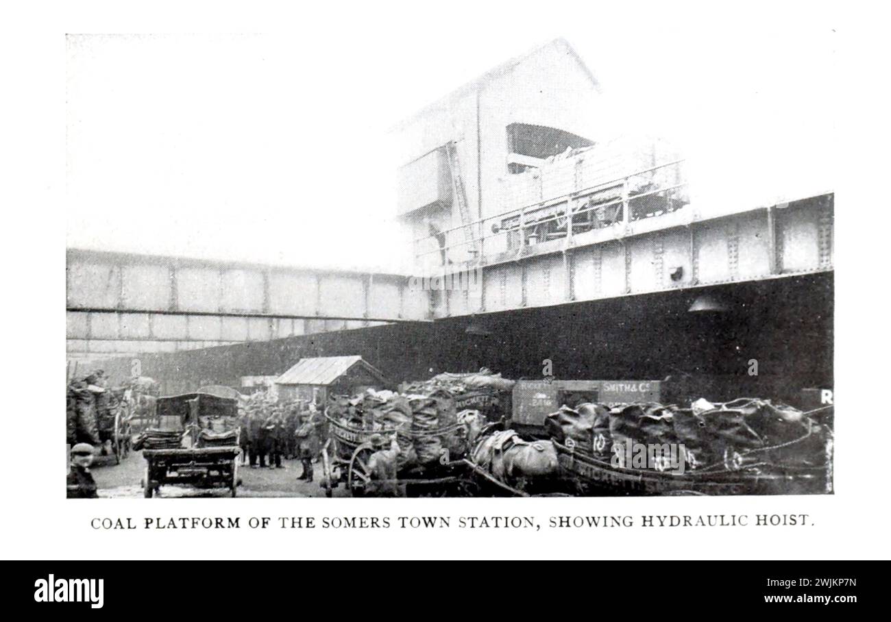 COAL PLATFORM OF THE SOMERS TOWN STATION, SHOWING HYDRAULIC HOIST. from the Article ENGLISH GOODS STATIONS AND RAILWAY YARDS. By Arch. R. Whitehead. from The Engineering Magazine Devoted to Industrial Progress Volume XIV October 1897 - March 1898 The Engineering Magazine Co Stock Photo